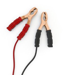 Emergency kit containing first aid, spare tire, jumper cables, and tire inflator