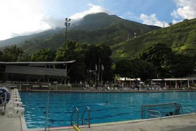 Hebraica Venezuela: The pool and stunning view of the Jewish community center in Caracas with the flag of Israel in the back ground. 